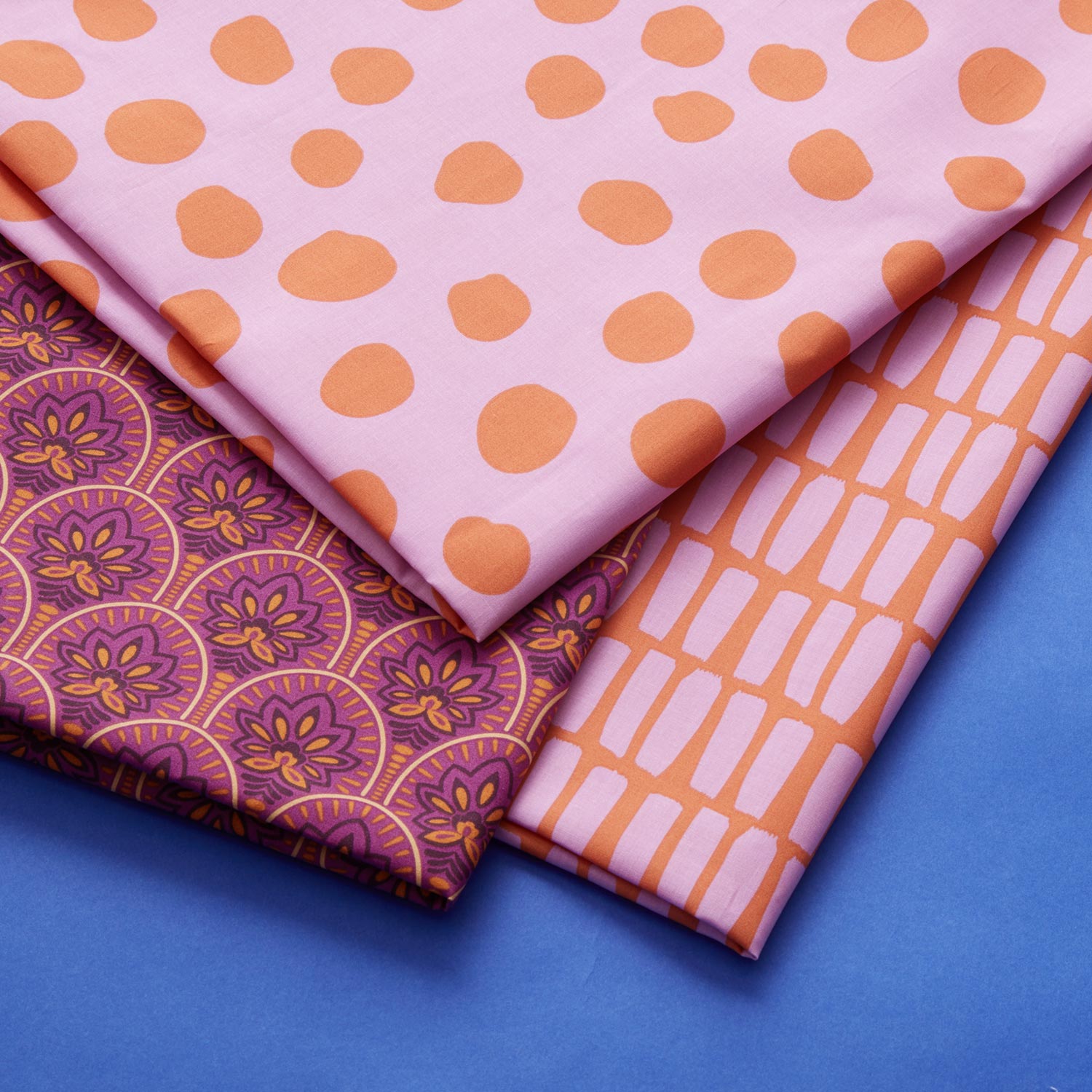 Coton enduit Coups de pinceau – orange/violet pastel
